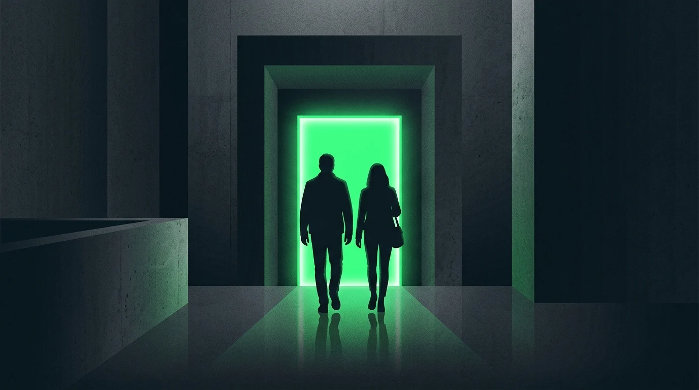 A green glowing doorway in a dark room.